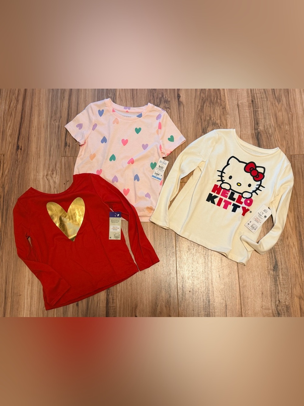 Hello Kitty Cream Tee, heart pattern tee and gold heart graphic tee